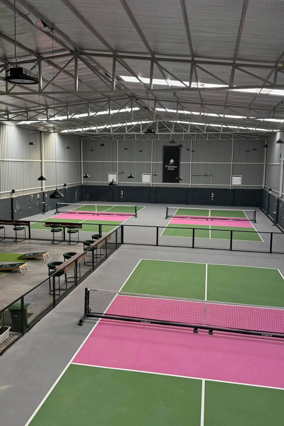Current interior of Pickleflow Social with pickleball courts